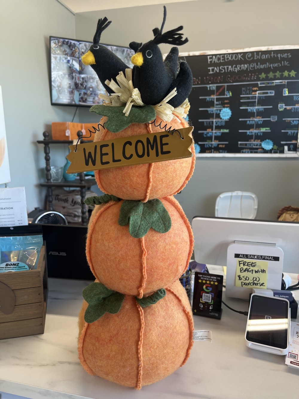 Stacked pumpkins welcome sign