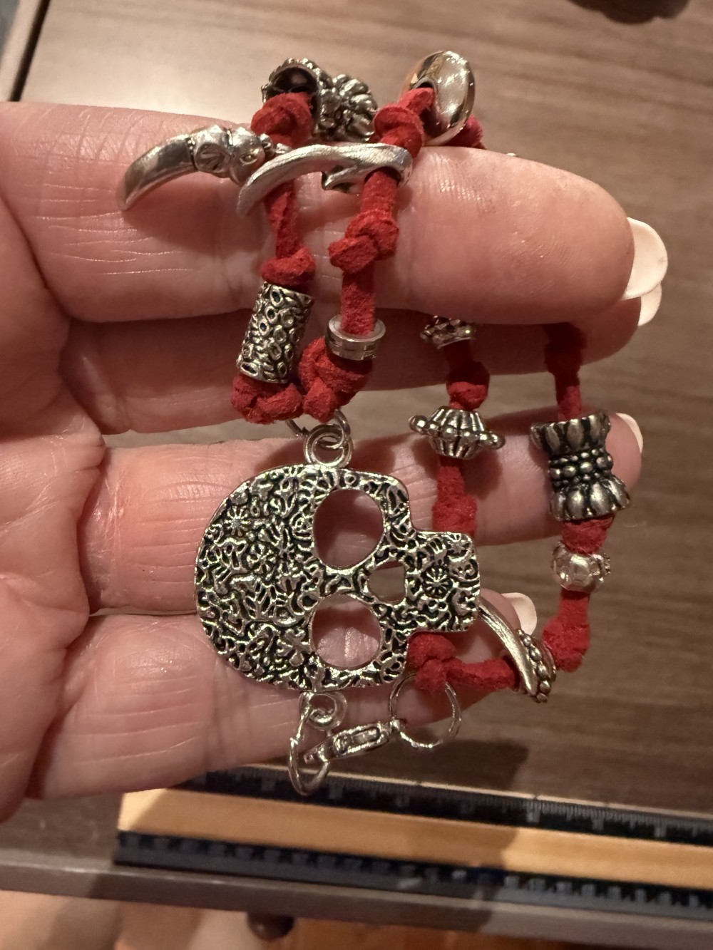 Bracelet - Silver skull Red leather bead accents