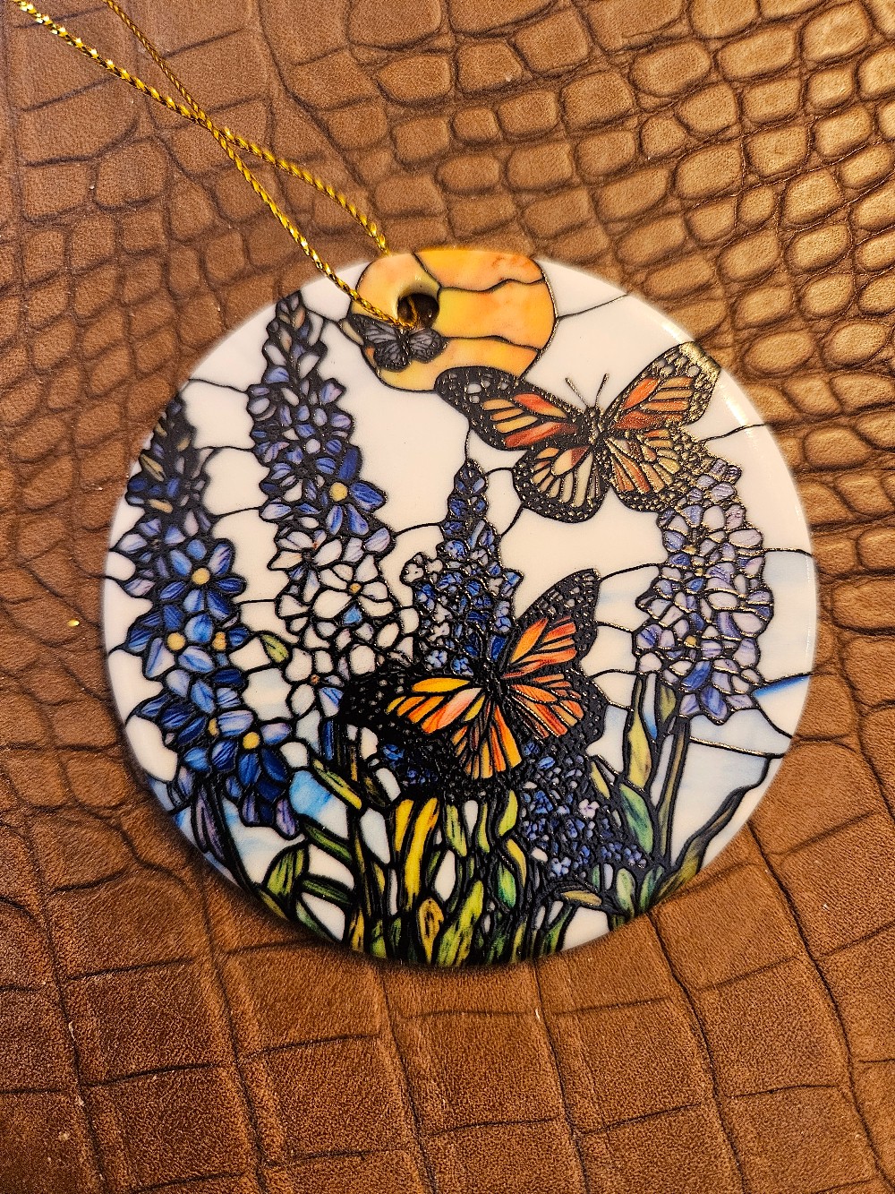 This is a Lavender Monarch Butterfly ornament