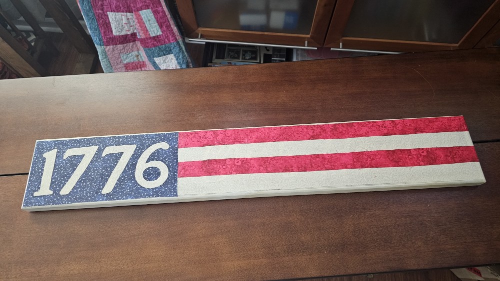 1776 wooden wall sign