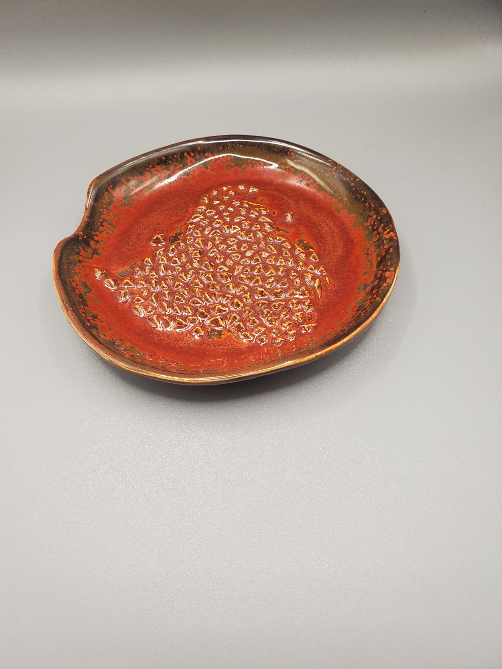 Elusive Enterprize Pottery Garic Grater