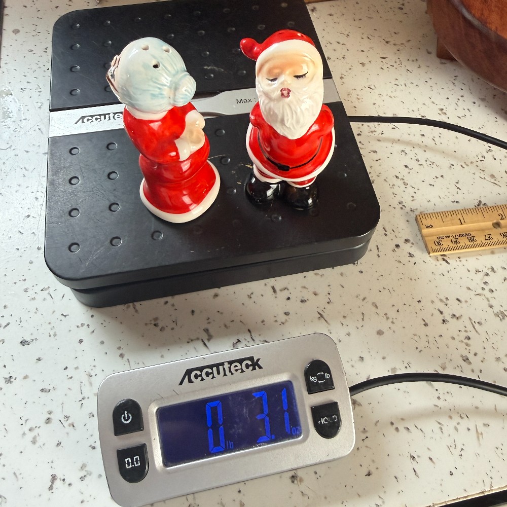 Kissing Santa and Mrs. Claus Salt and Pepper Shakers - DANA