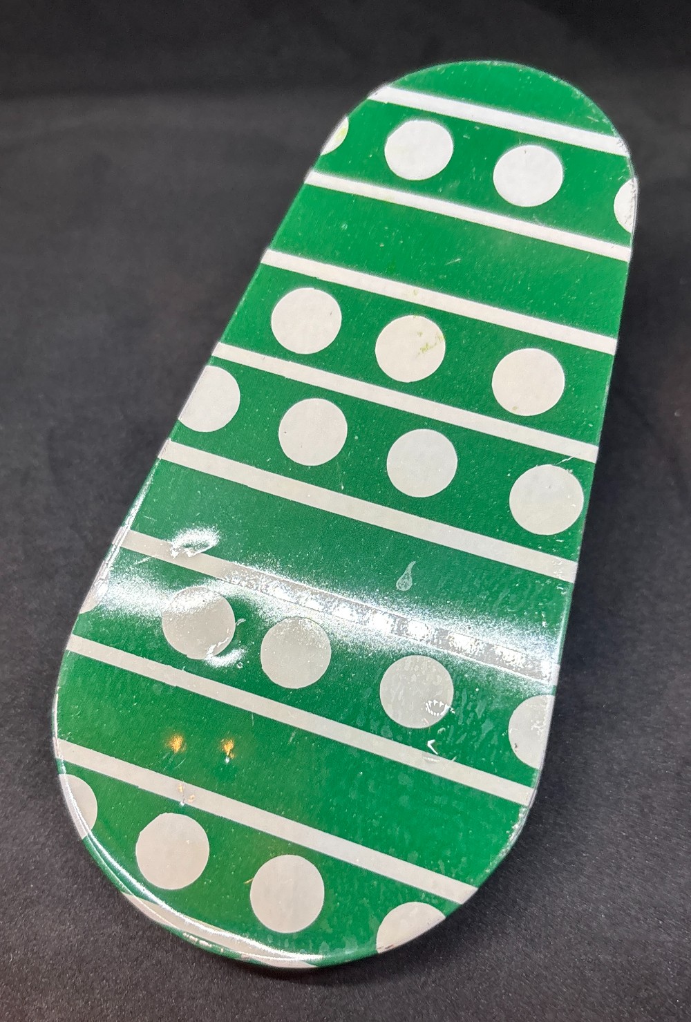 Vintage long metal green & white dots party noise maker