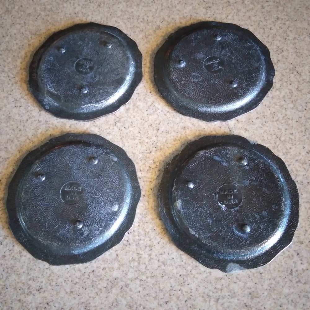 Universal Studios Bronze Coasters Set of 4