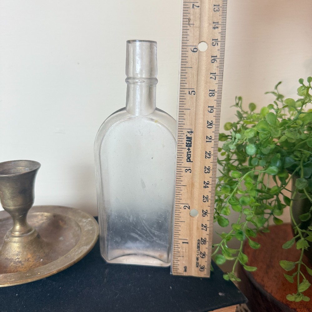 Antique Clear Glass Strap-Side Whiskey Flask