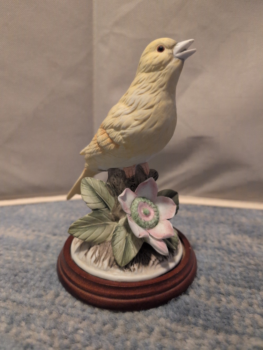 Canary Figurine on wood stand