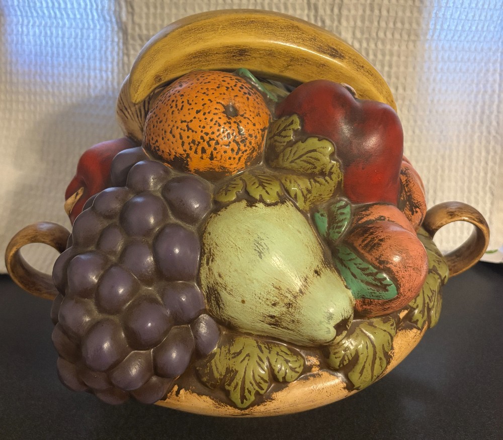 Low handled tan urn and fruit ceramic centerpiece
