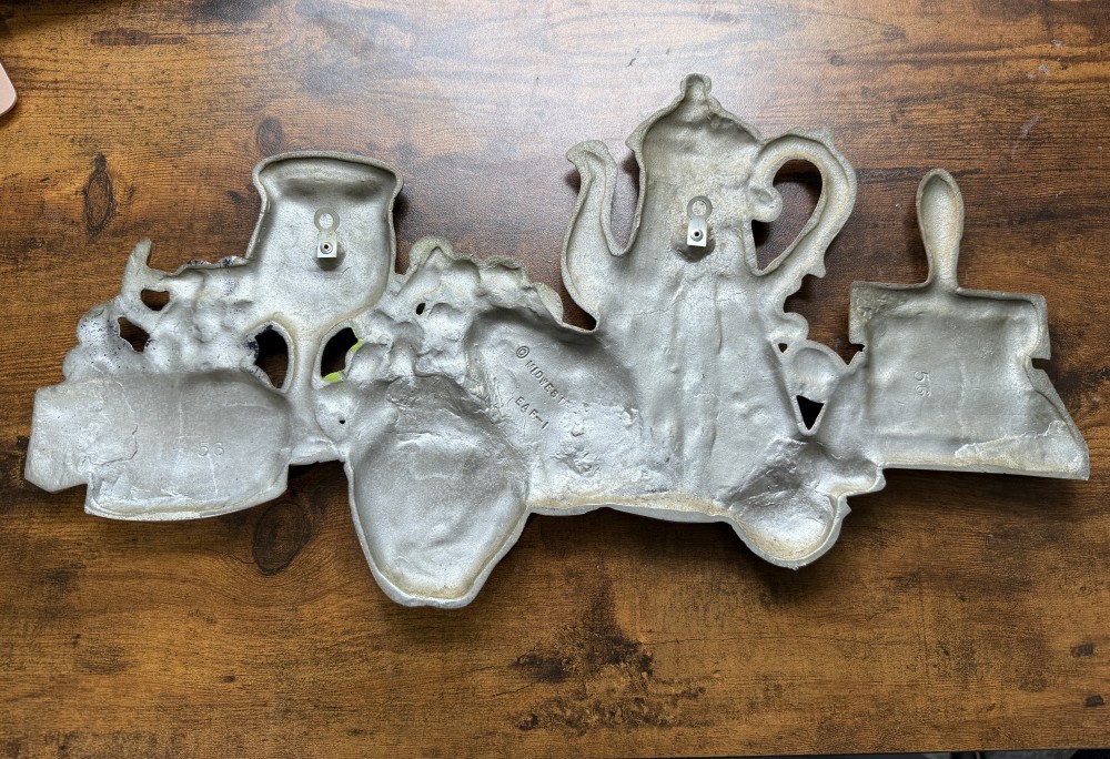 Midwest vintage metal wall plaque