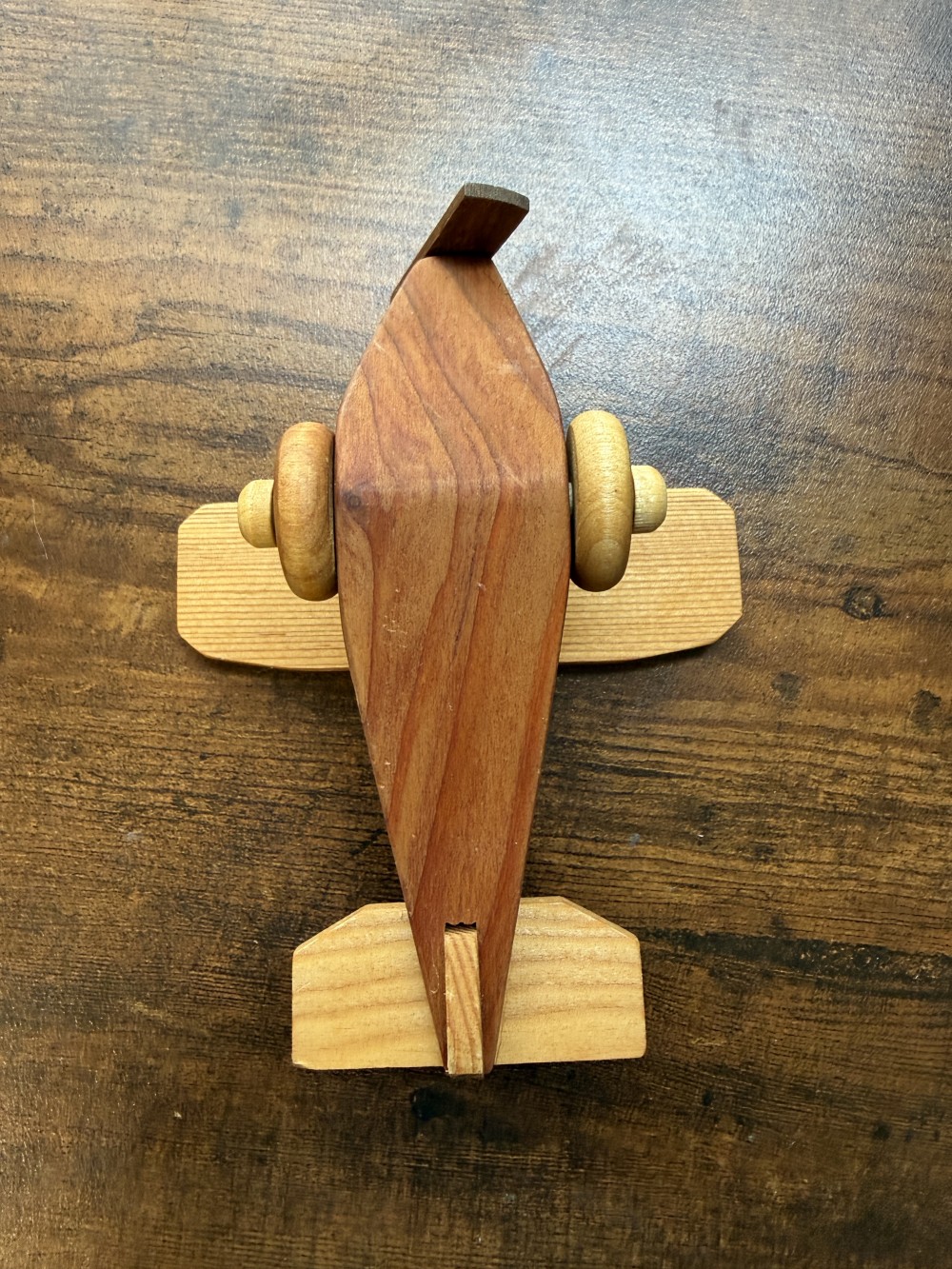 Handmade wooden biplane toy
