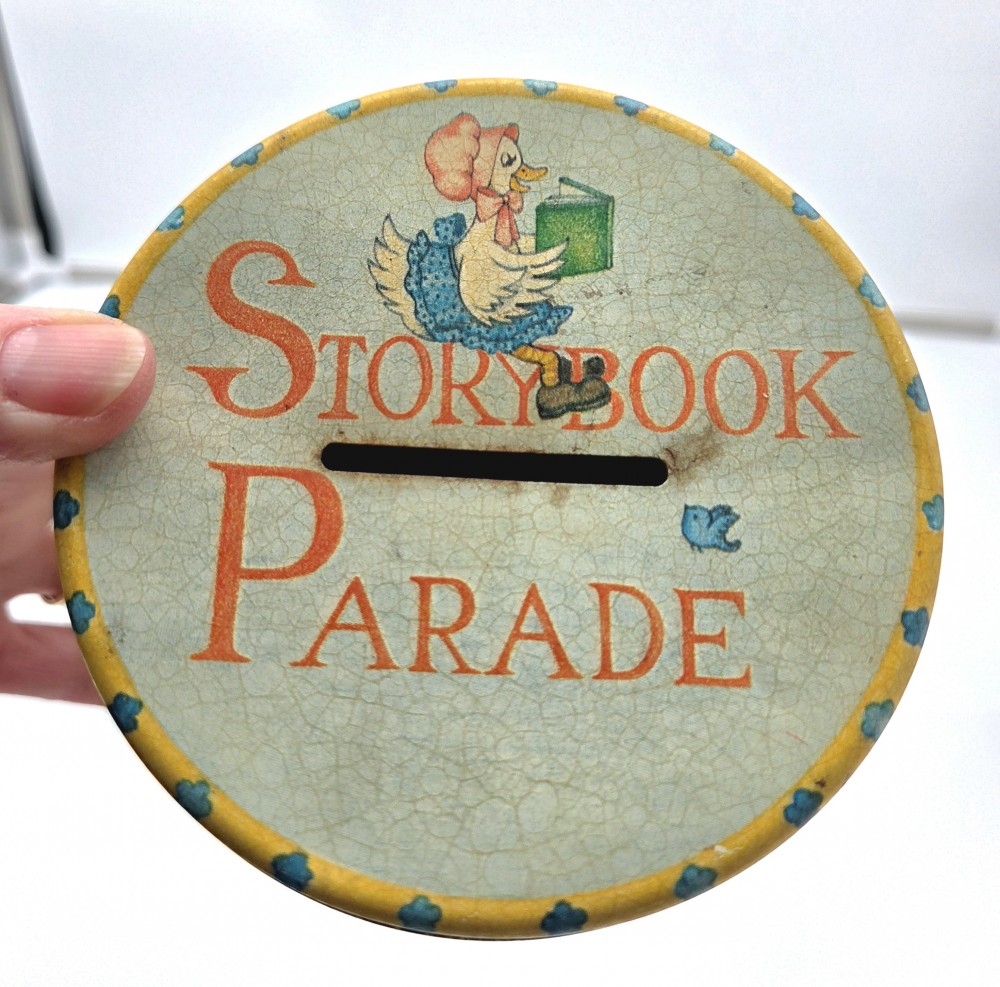 VTG Storybook Parade Tin Coin Bank