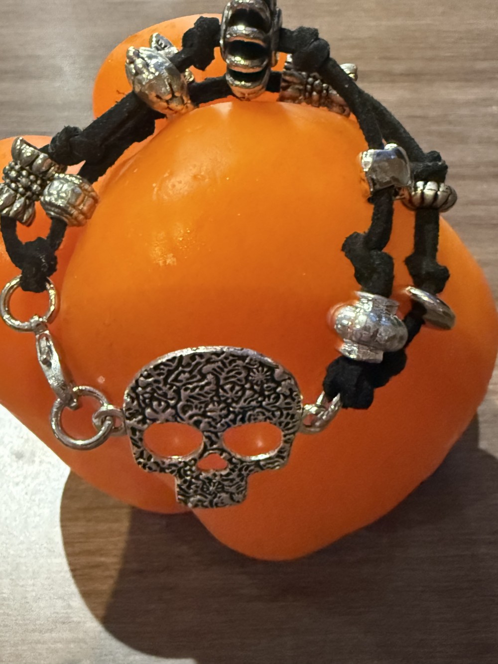 Bracelet - Silver skull Black leather bead accents