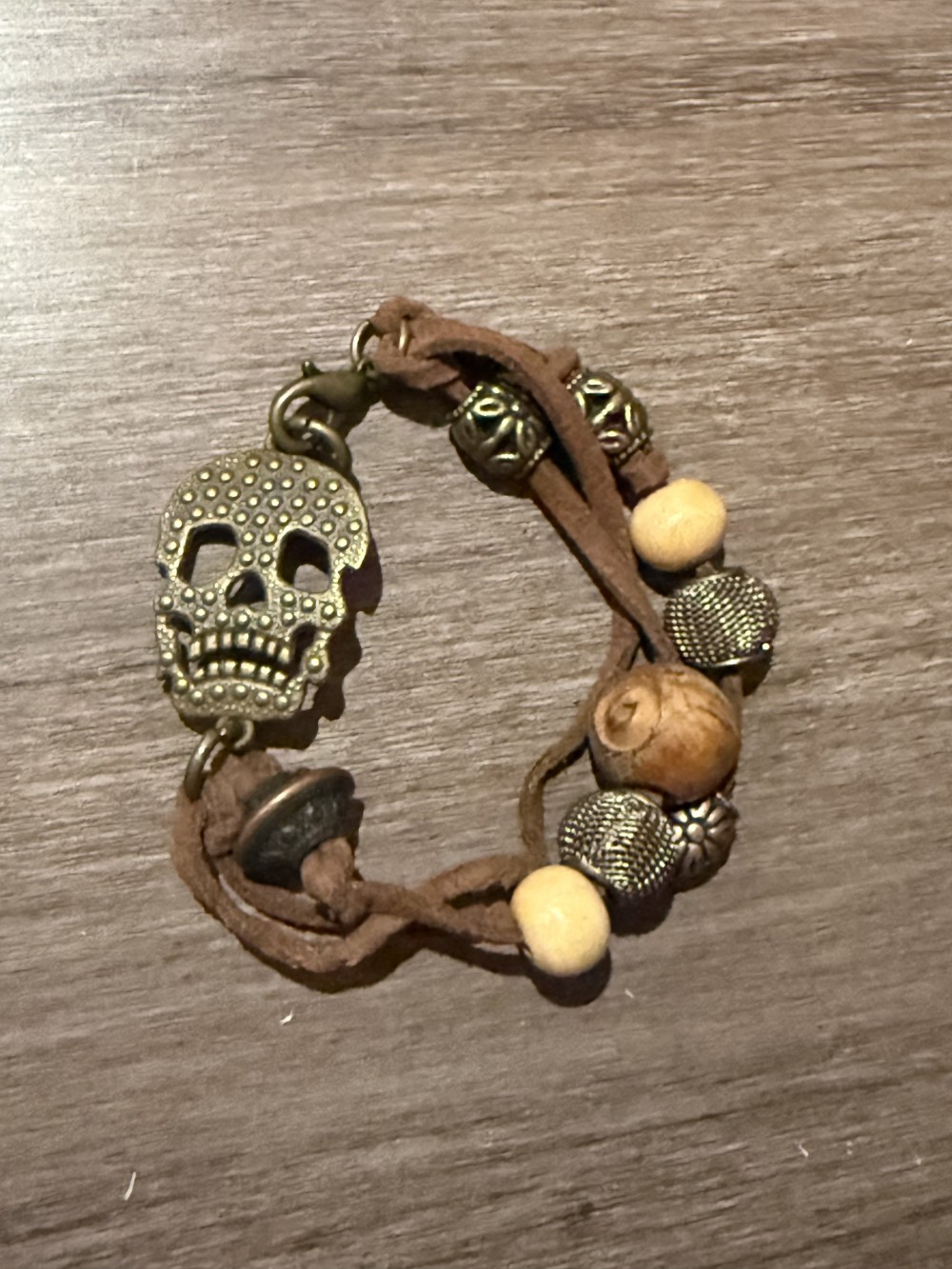 Bracelet - Bronze skull brown leather bead accents