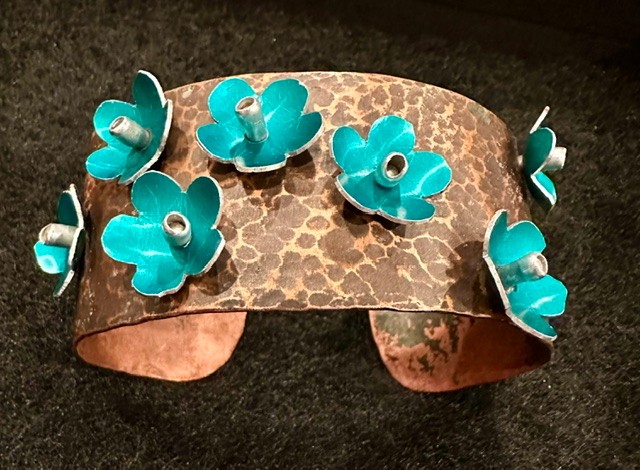 Hammered copper cuff with turquoise flower accents