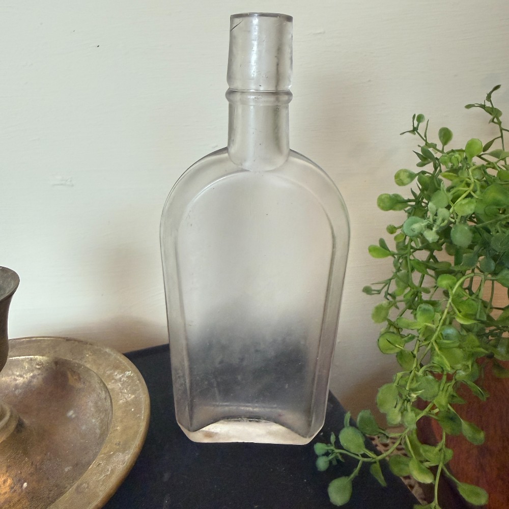 Antique Clear Glass Strap-Side Whiskey Flask