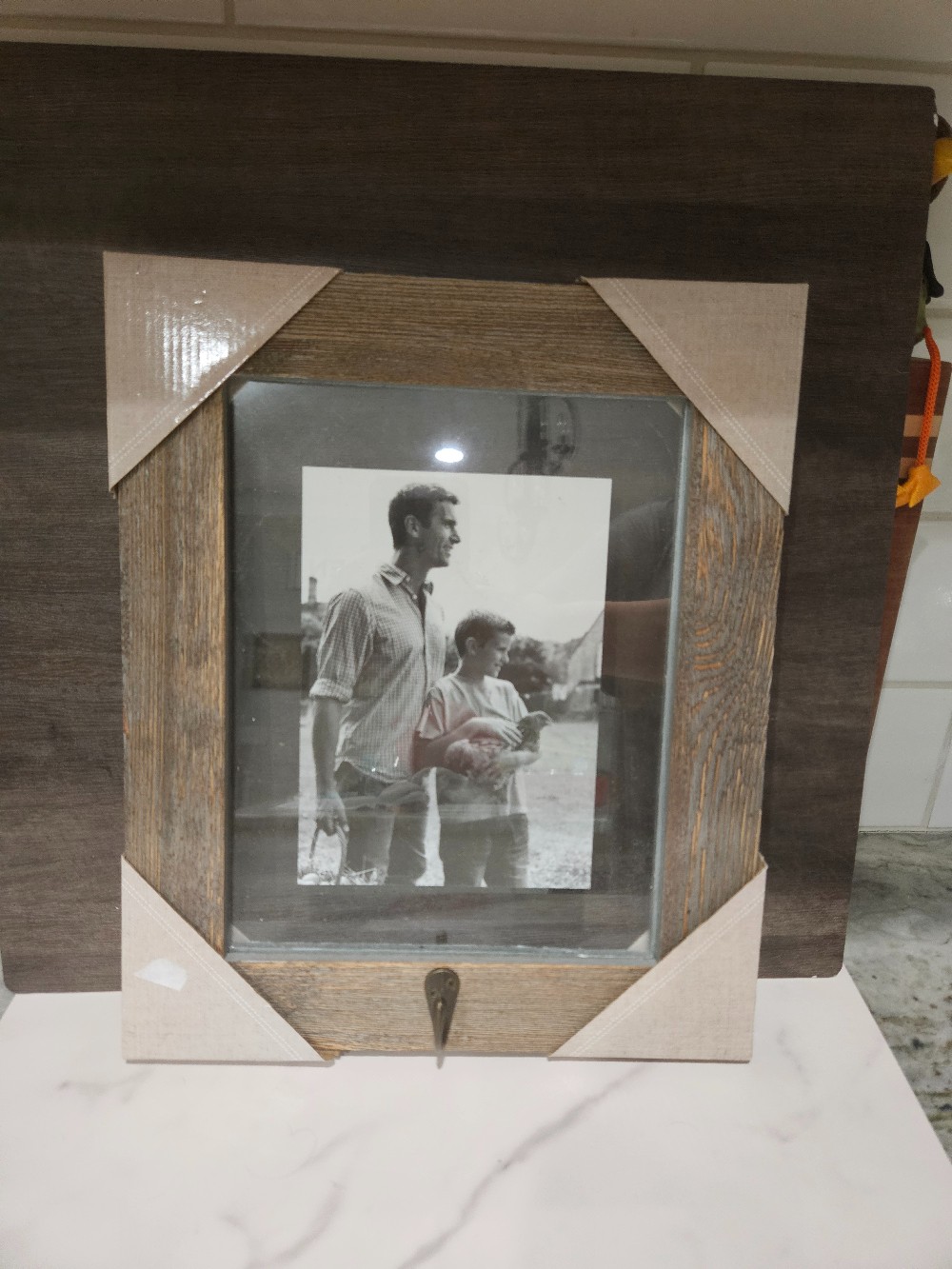 Floating picture frame with hook