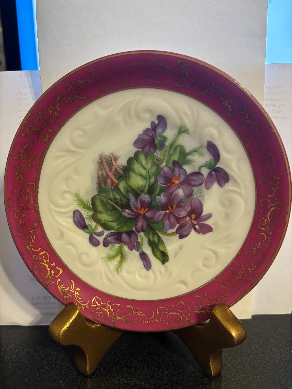Porcelain white w/violets & pink border gold trim saucer
