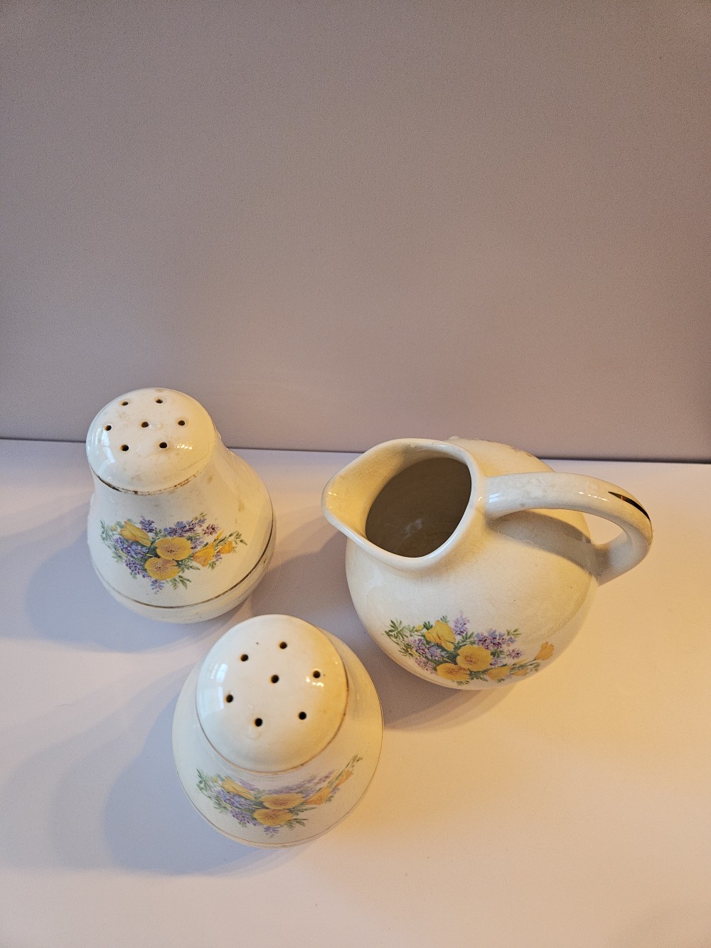 Universal Potteries creamer & salt and pepper shaker set featuring the California Poppy pattern (UNI177).