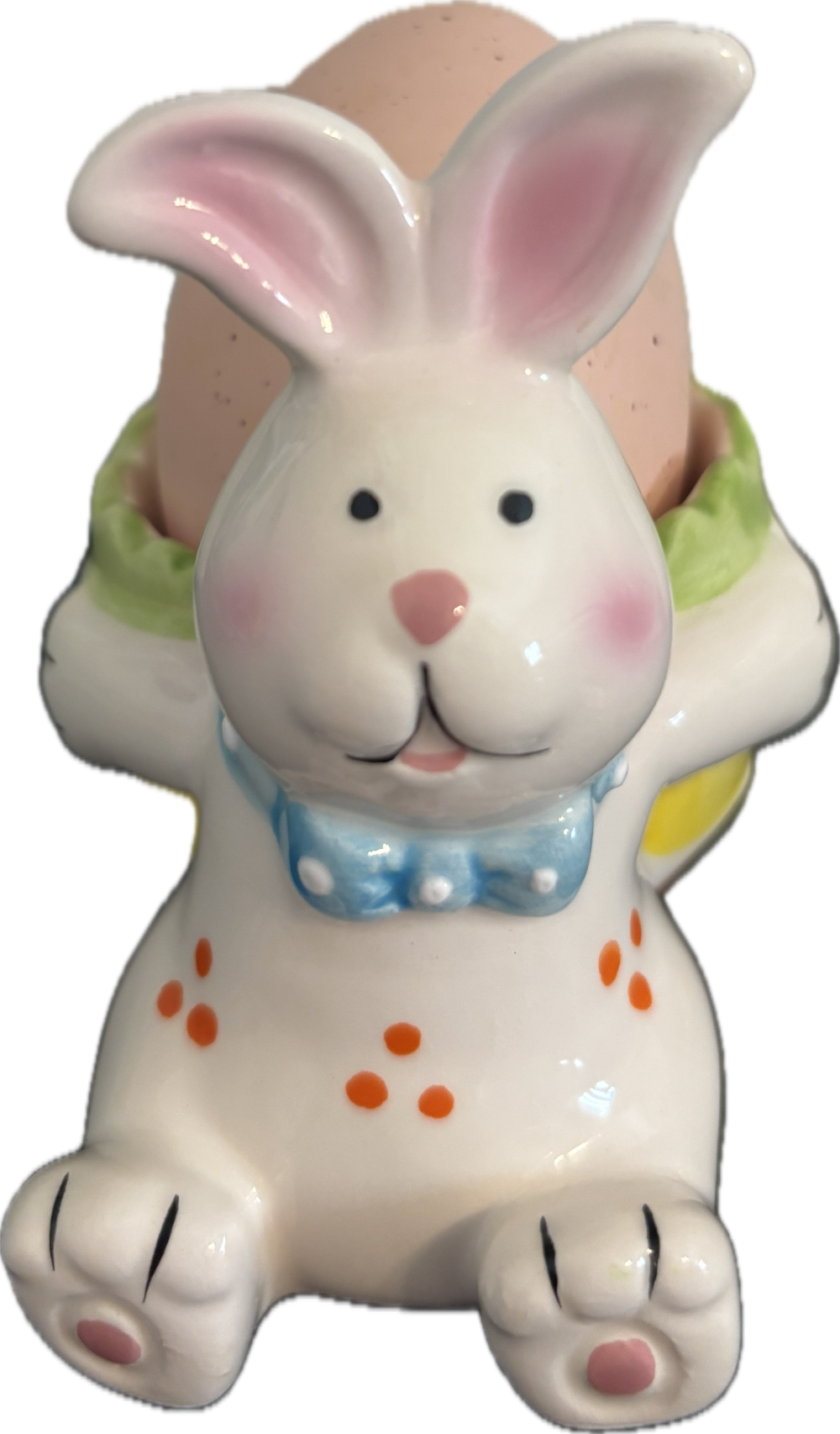 White ceramic Easter bunny egg cup w/pink resin egg.