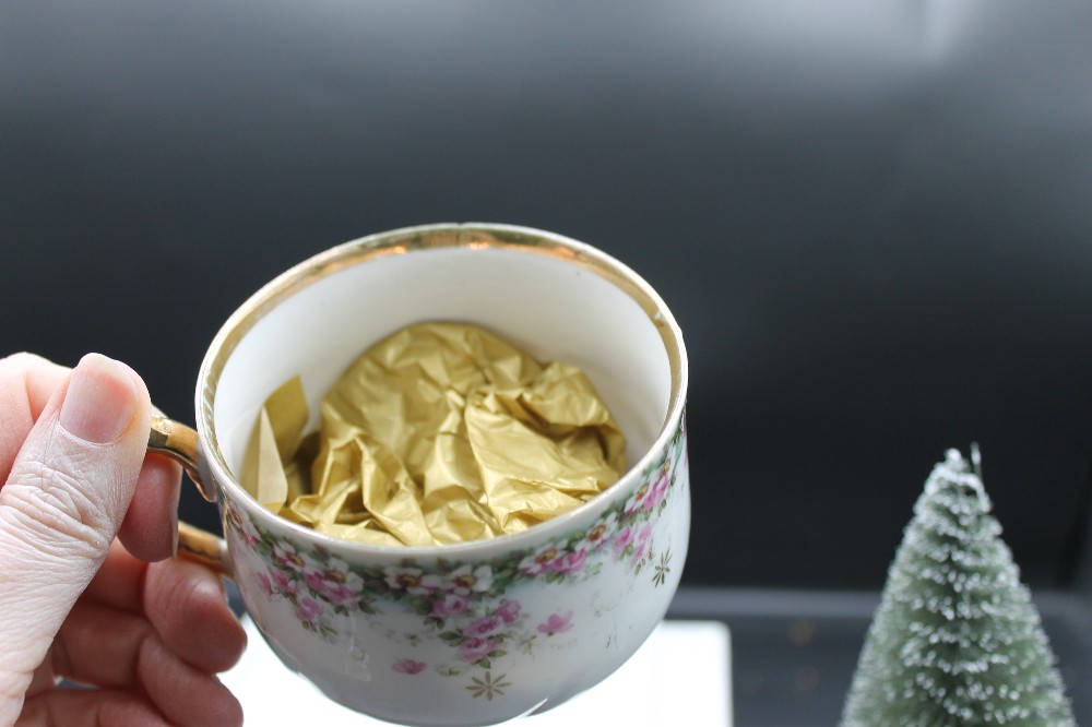 Decorative teacup/removable faux tree white/gold handle/pink flowers