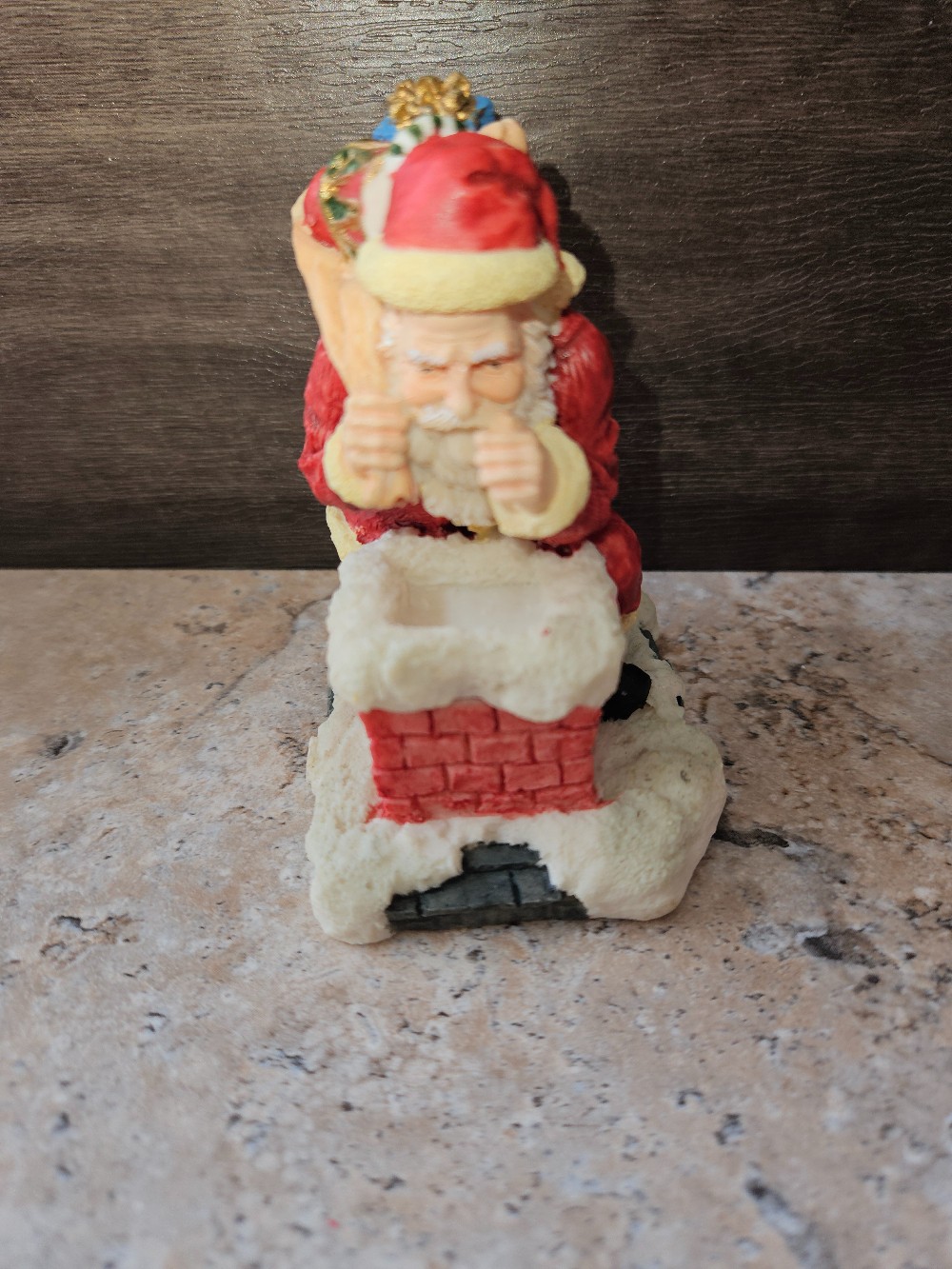 Brinn's handcrafted collectible Santa Claus figurine titled 