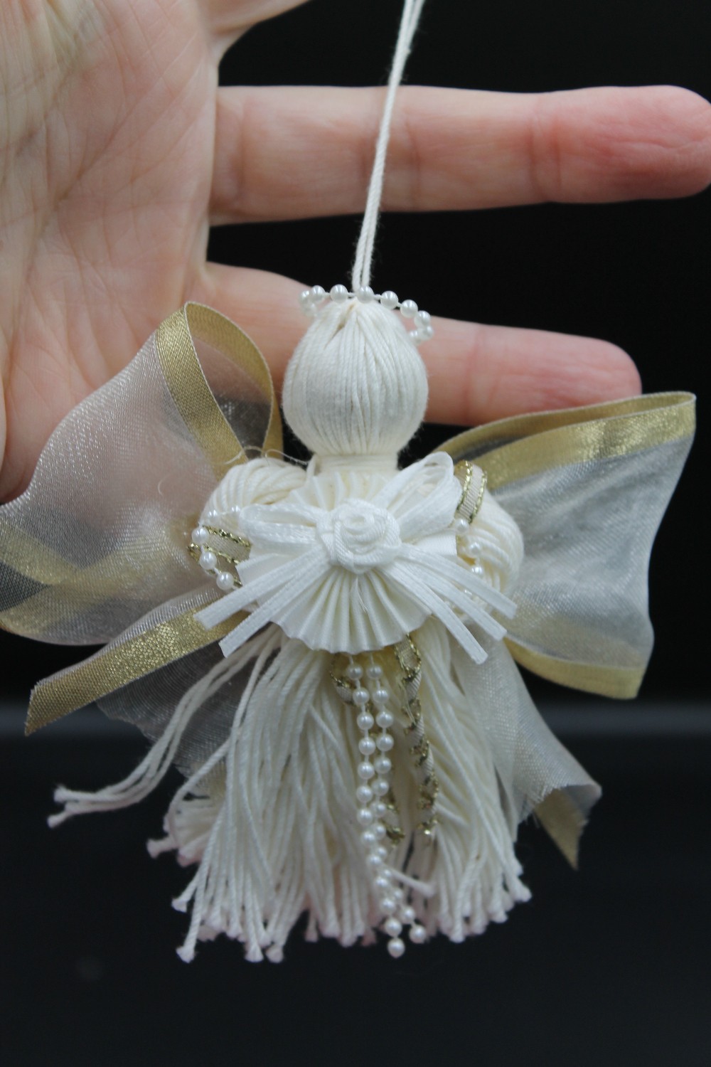 Handmade yarn tassel angel ornament