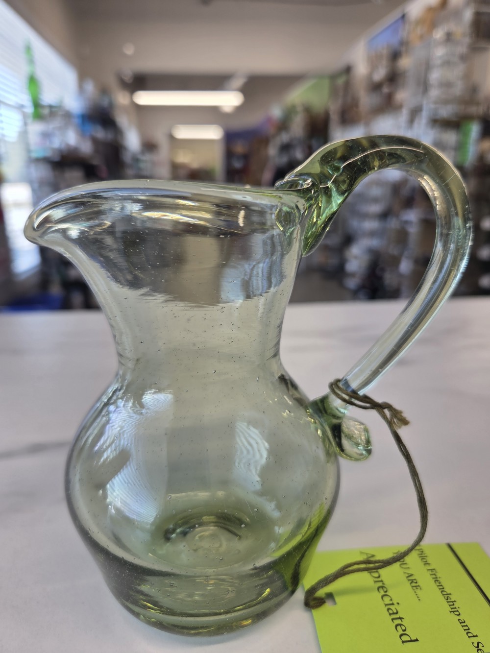 GP-131 hand blown green pitcher