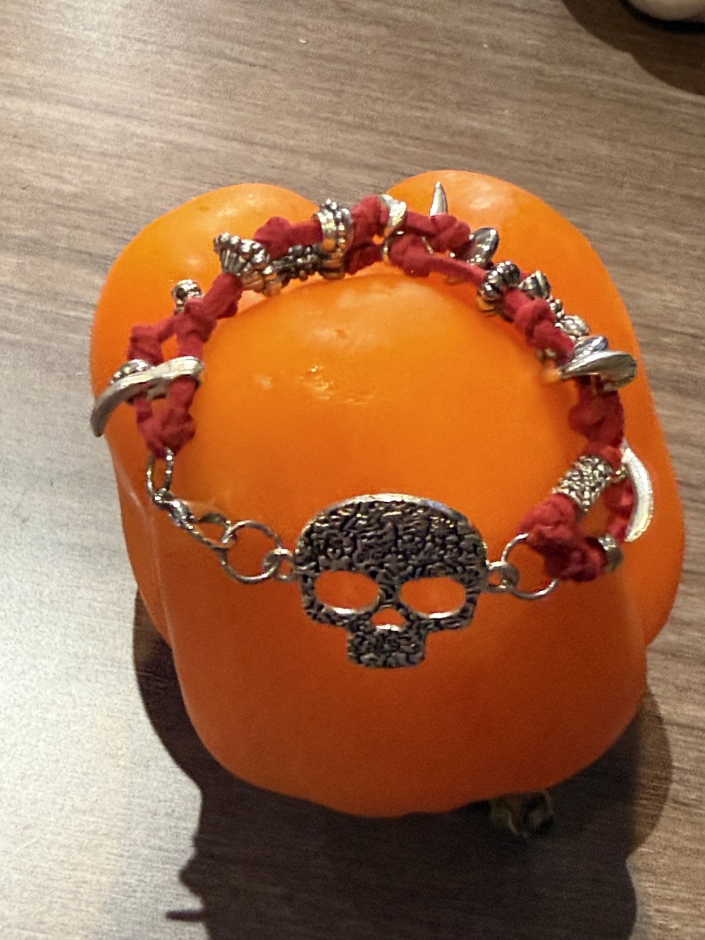 Bracelet - Silver skull Red leather bead accents