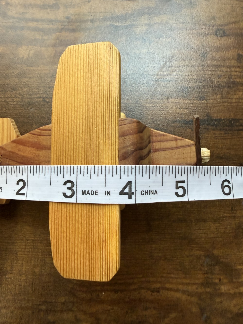 Handmade wooden biplane toy