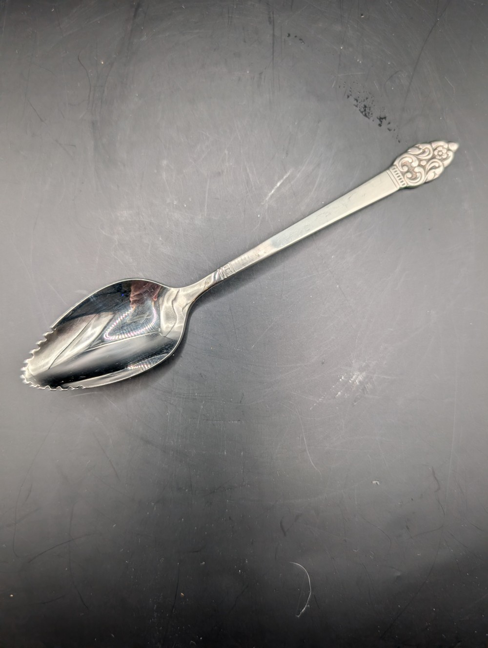 Vintage Oneida grapefruit spoon