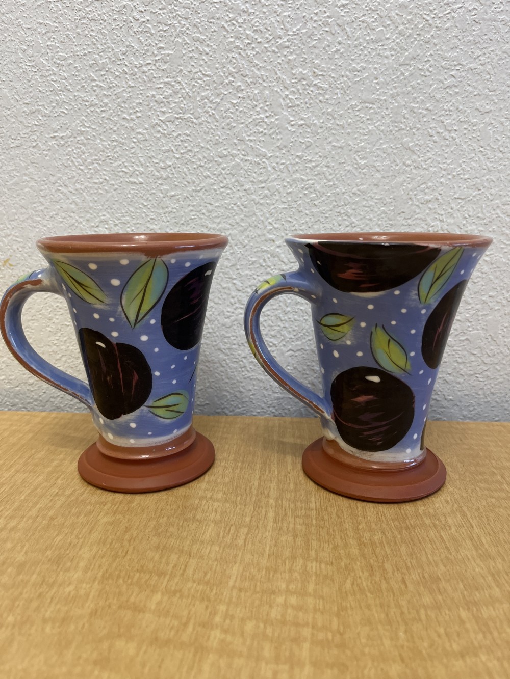 Pair of Phyllis Handal Pottery mugs