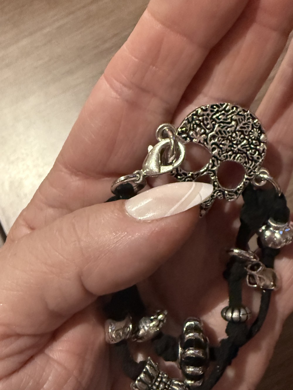 Bracelet - Silver skull Black leather bead accents