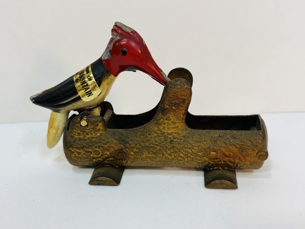 vintage mechanical woodpecker toothpick holder