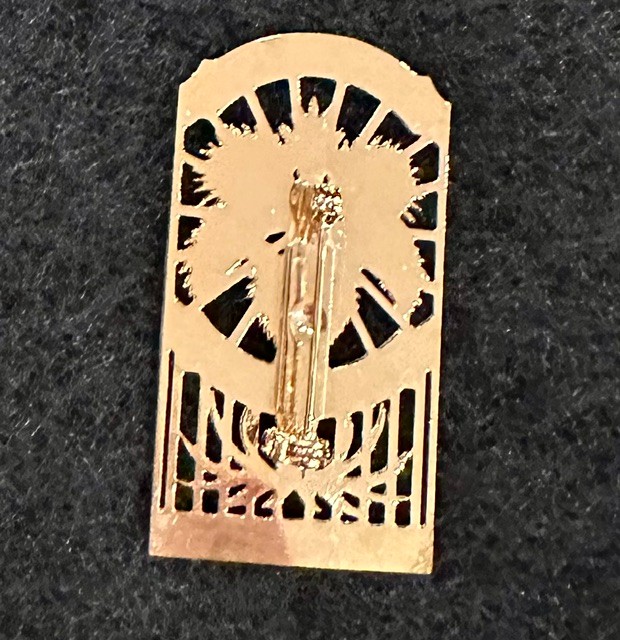 Palm frond garden gate gold tone pin / brooch