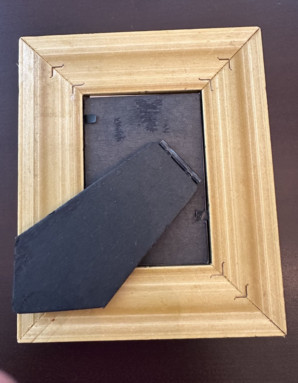 Vint style gold and green frame with fern print. Easel back.
