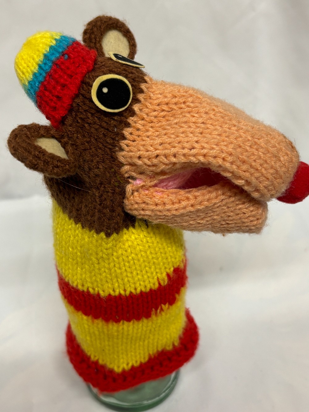 Plush knitted hand puppet red yellow brown stripes bear Russ Berrie