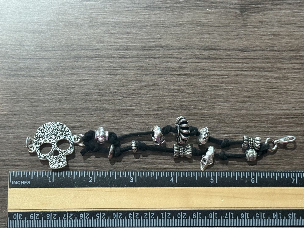 Bracelet - Silver skull Black leather bead accents