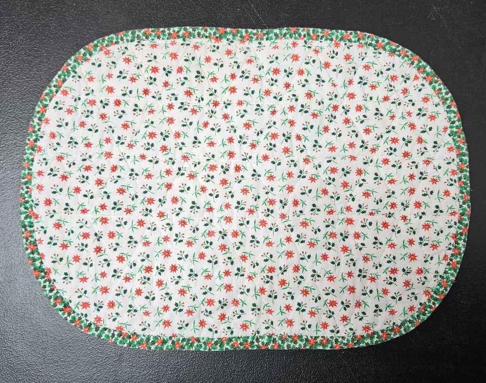 handmade, oval quilted placemat
