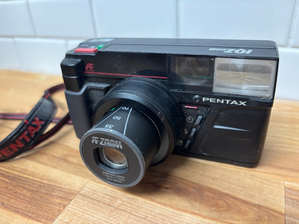 Camera Pentax IQZoom 70 AF 35mm Point & Shoot Film Camera with Original Strap