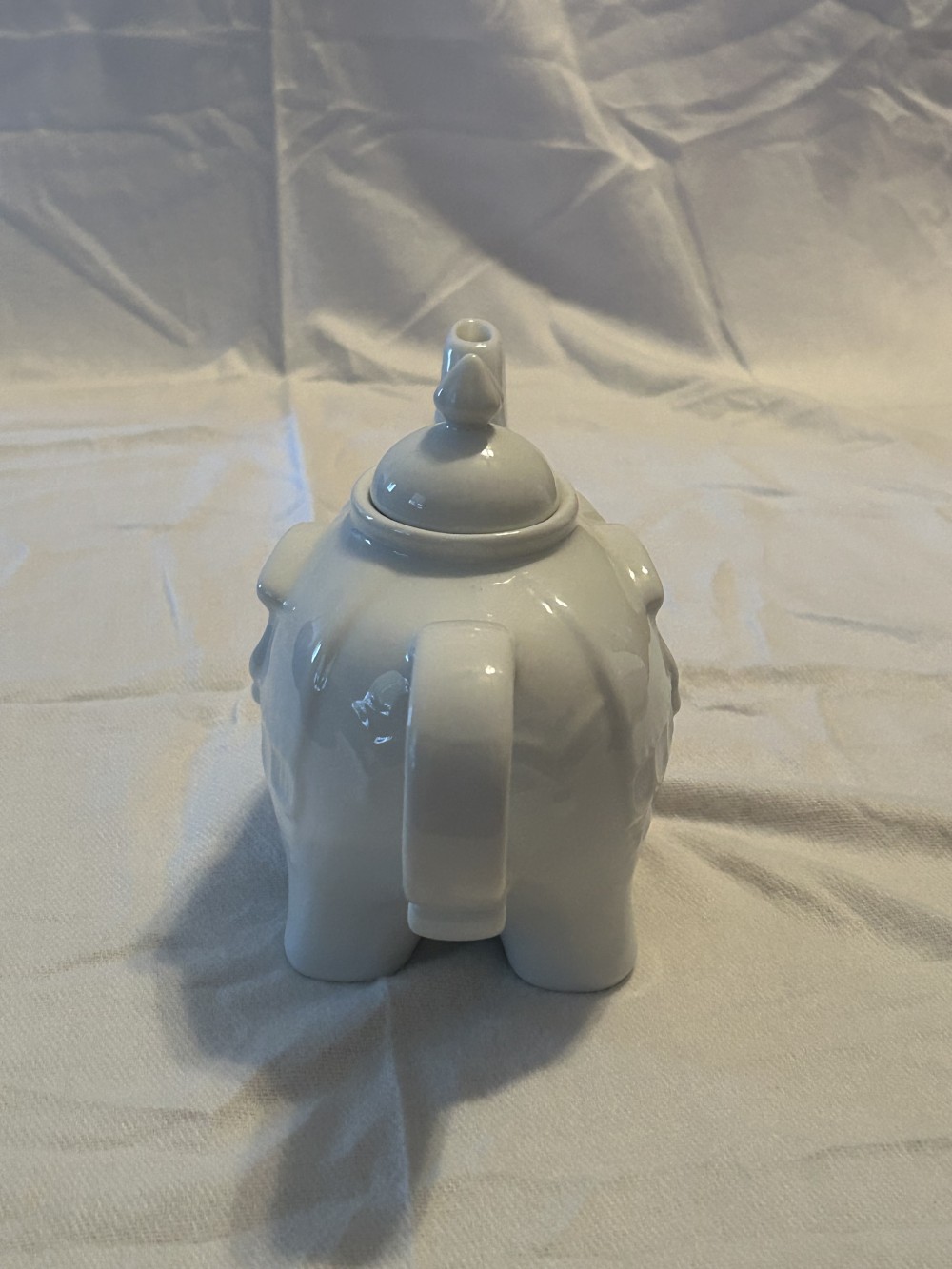 BIA Cordon Bleu Elephant Teapot, a whimsical 28-ounce serving vessel crafted from high-quality white porcelain - great condition - as is - see pics