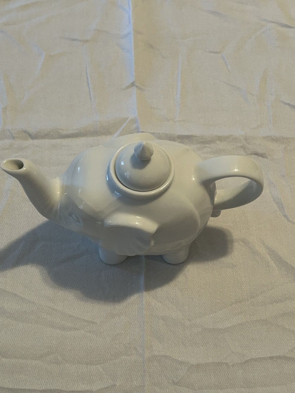 BIA Cordon Bleu Elephant Teapot, a whimsical 28-ounce serving vessel crafted from high-quality white porcelain - great condition - as is - see pics