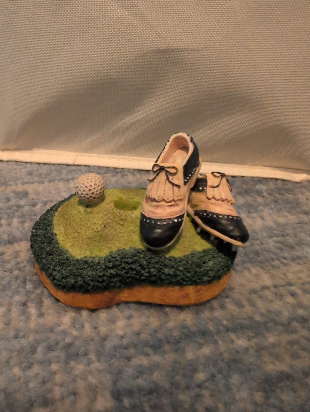 Golf shoe pen holder