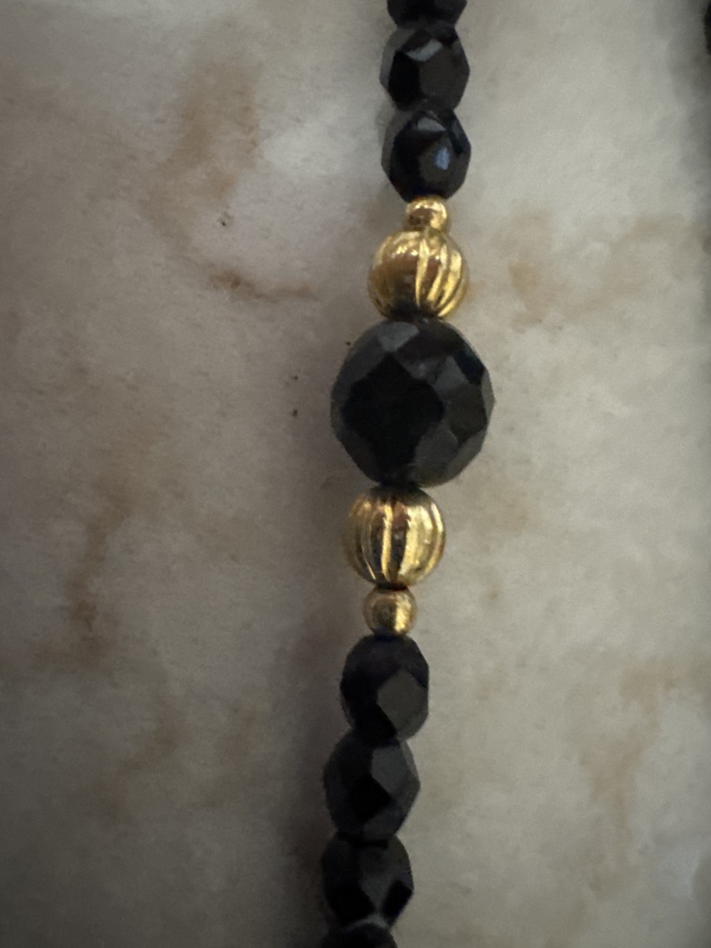 NECKLACE, BLACK GLASS BEADS/GOLD SPACERS