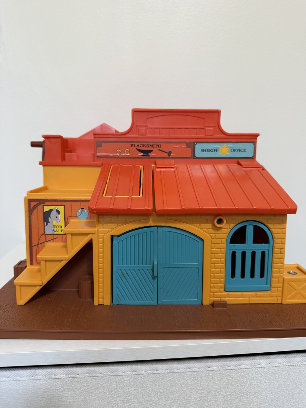 Fisher price play family western town