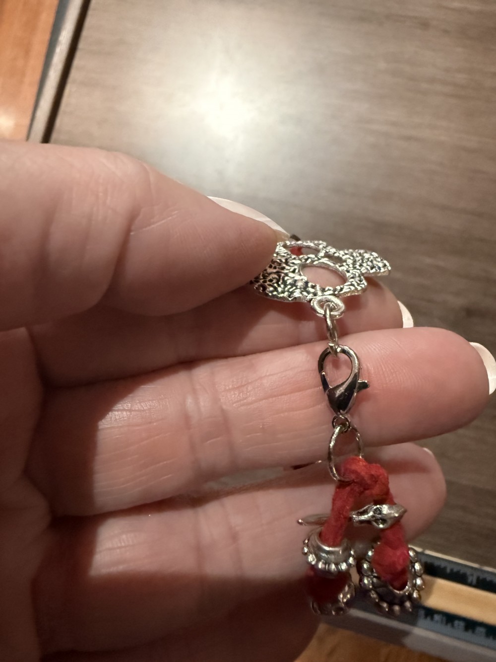 Bracelet - Silver skull Red leather bead accents