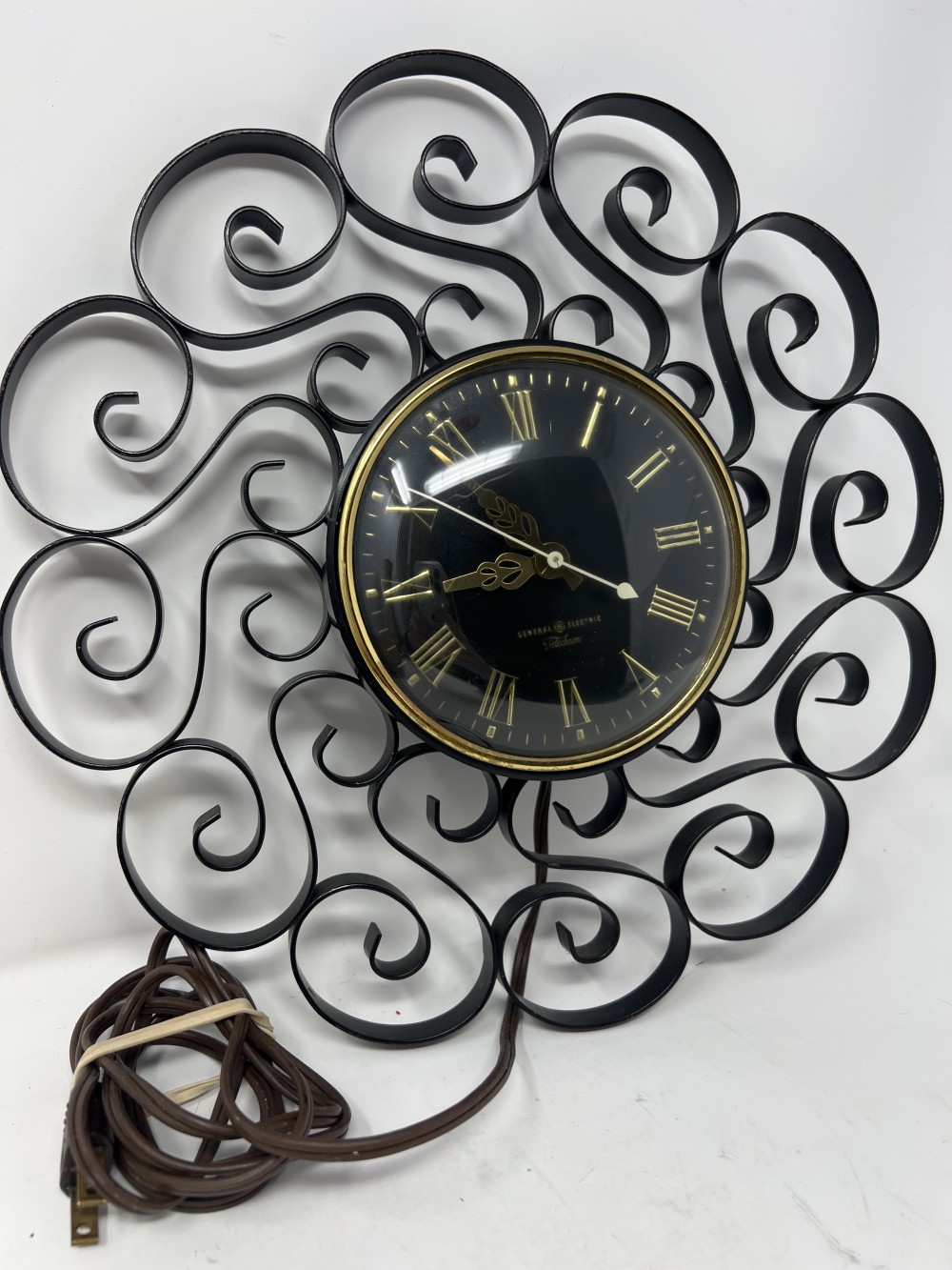 MCM wrought iron wall clock