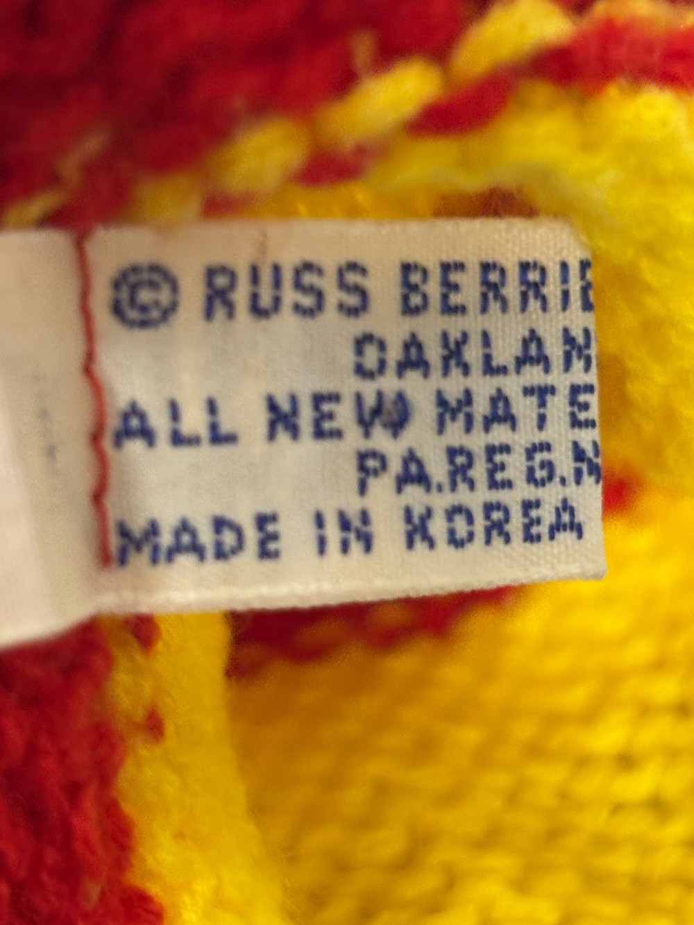 Plush knitted hand puppet red yellow brown stripes bear Russ Berrie