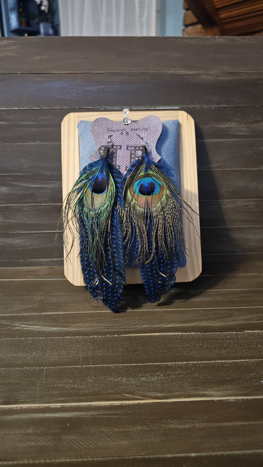 Long peacock feather earrings