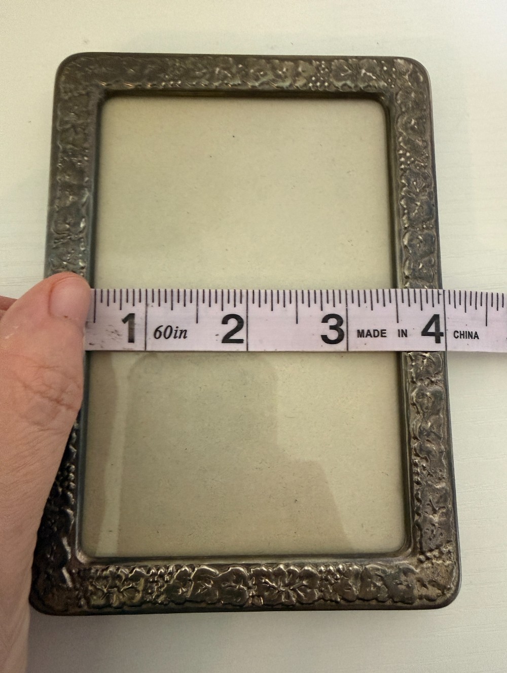 Silver tone frame