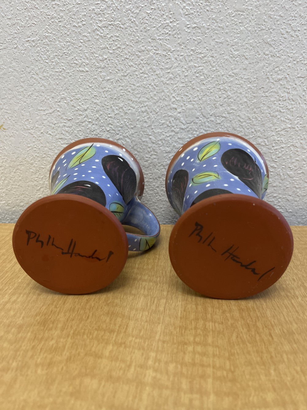 Pair of Phyllis Handal Pottery mugs