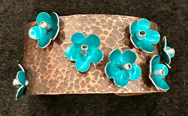 Hammered copper cuff with turquoise flower accents